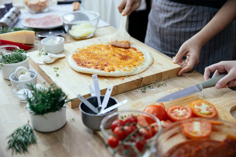 Fresh ingredients prepared for pizza making